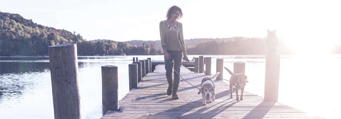 Woman on dock with Dog